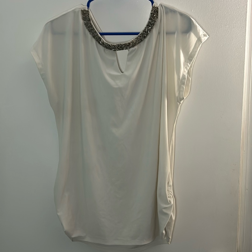 Maurices white size xl blouse, draped back.